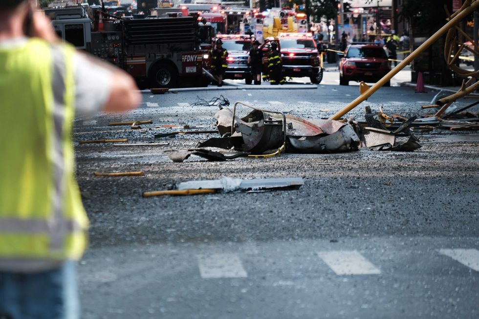Glass, concrete and other debris crashed onto the street during the collapse