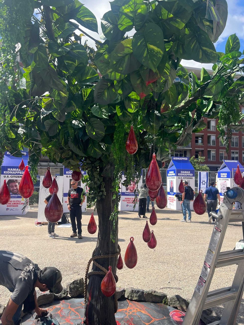 Glass drops of "blood" falling from tree.
