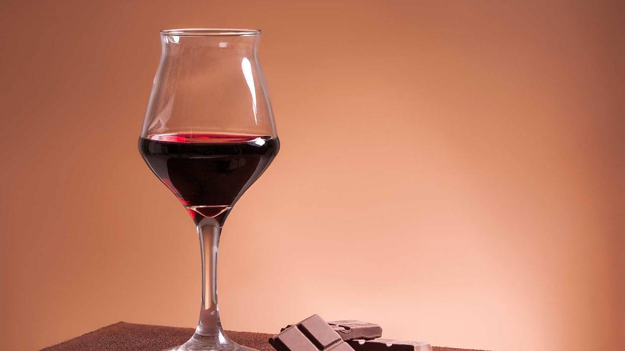 Glass of red wine with chocolate