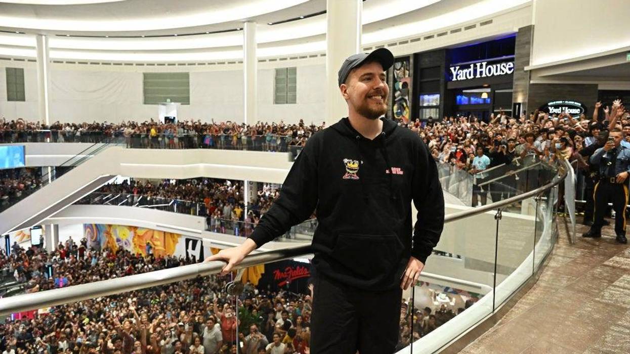 Global YouTube star MrBeast poses with fans at the launch of the first physical MrBeast Burger Restaurant at American Dream on September 4, 2022 in East Rutherford, New Jersey