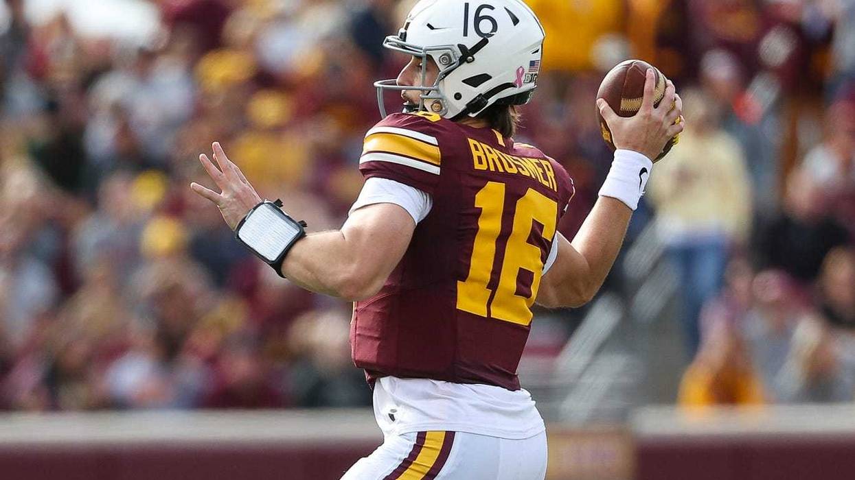 Golden Gophers quarterback Max Brosmer (16) throws the ball against the Maryland Terrapins during the first half at Huntington Bank Stadium.