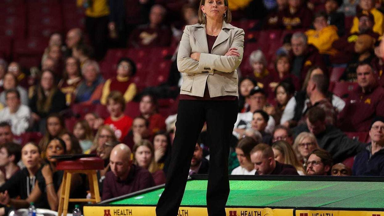 Golden Gophers women's basketball head coach Dawn Plitzuweit looks on during a game at Williams Arena.