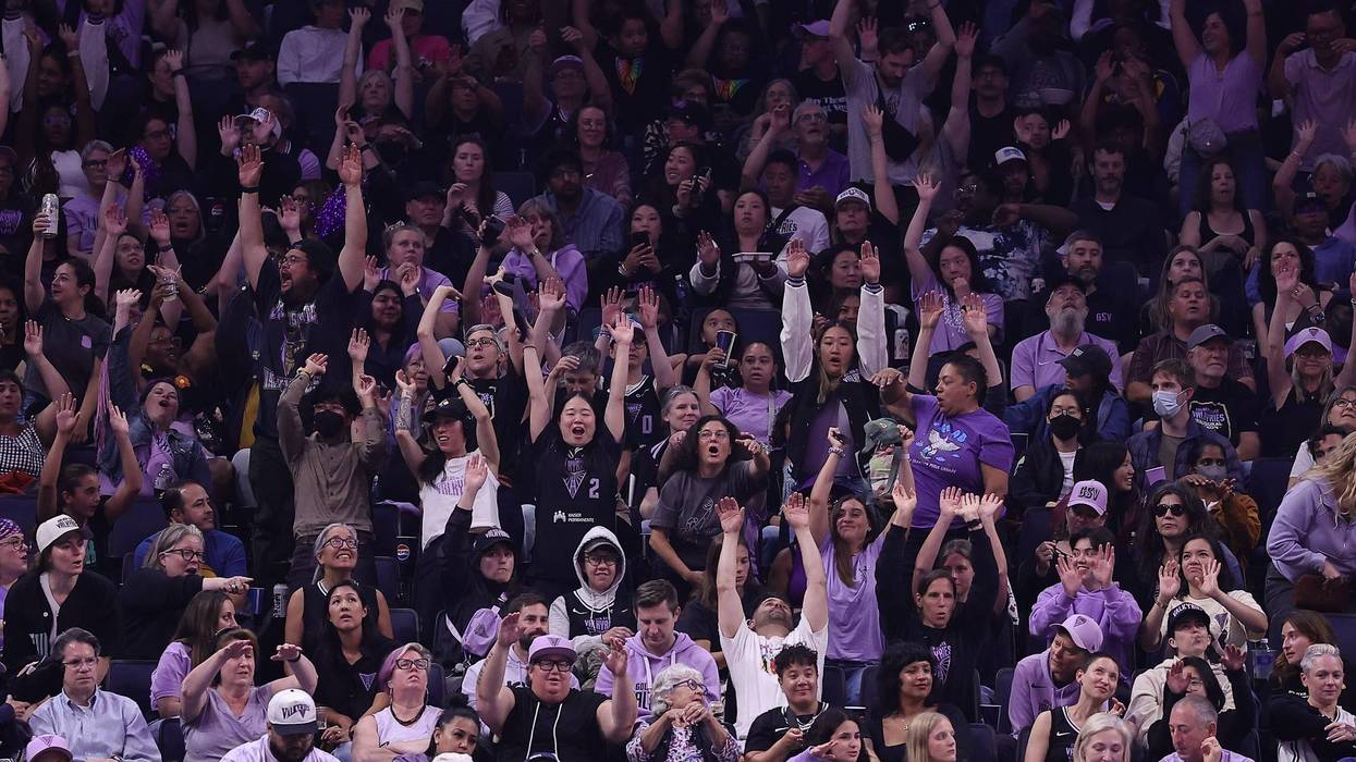 Golden State Valkyries fans do the wave during a timeout against the New York Liberty during the second quarter at Chase Center