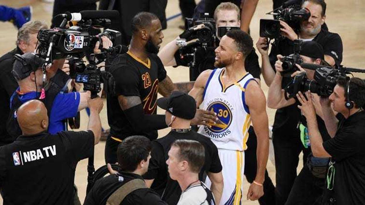 Golden State Warriors guard Stephen Curry greets Cleveland Cavaliers forward LeBron James after Game 5 of the NBA Finals on June 13, 2018, at Oracle Arena in Oakland, California.