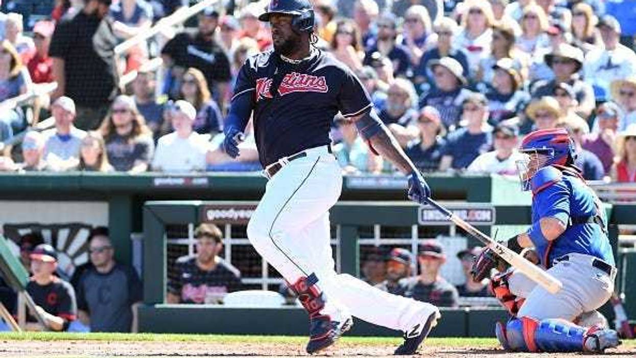 GOODYEAR, ARIZONA - MARCH 07: Franmil Reyes #32 of the Cleveland Indians follows through on a swing against the Chicago Cubs during a spring training game at Goodyear Ballpark on March 07, 2020 in Goodyear, Arizona.