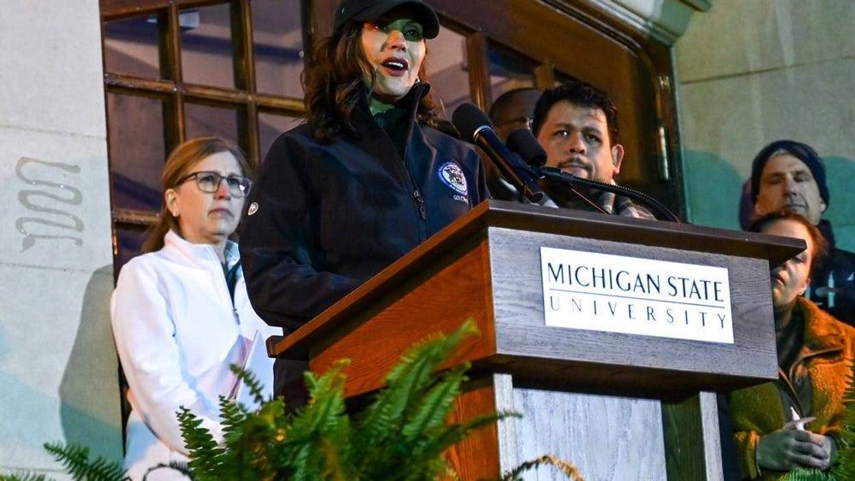 Gov. Gretchen Whitmer speaks at Michigan State University on Wednesday, Feb. 15, 2023, during a candlelight vigil honoring the victims of Monday s mass shooting on campus.
