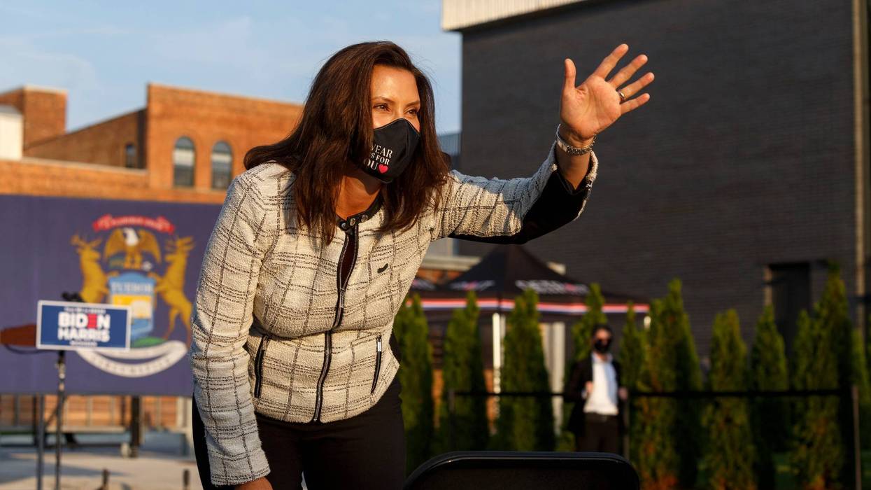 Gov. Gretchen Whitmer waves to the crowd before Democratic U.S. Vice Presidential nominee Sen. Kamala Harris (D-CA) during a voter mobilization event on September 22, 2020 in Detroit, Michigan.