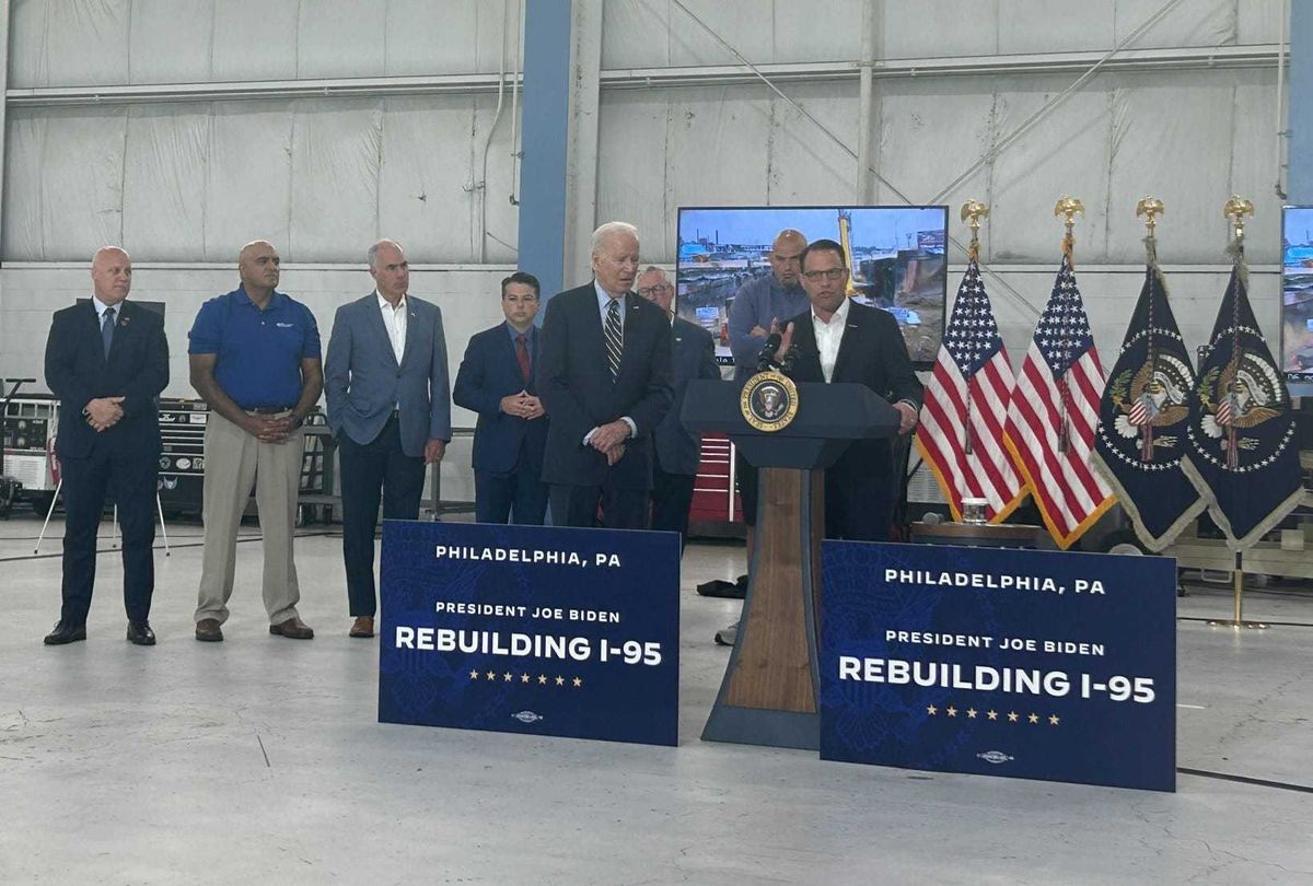 Gov. Josh Shapiro (right) addresses media on the timeline for reopening I-95, while appearing with President Joe Biden at Philadelphia International Airport.