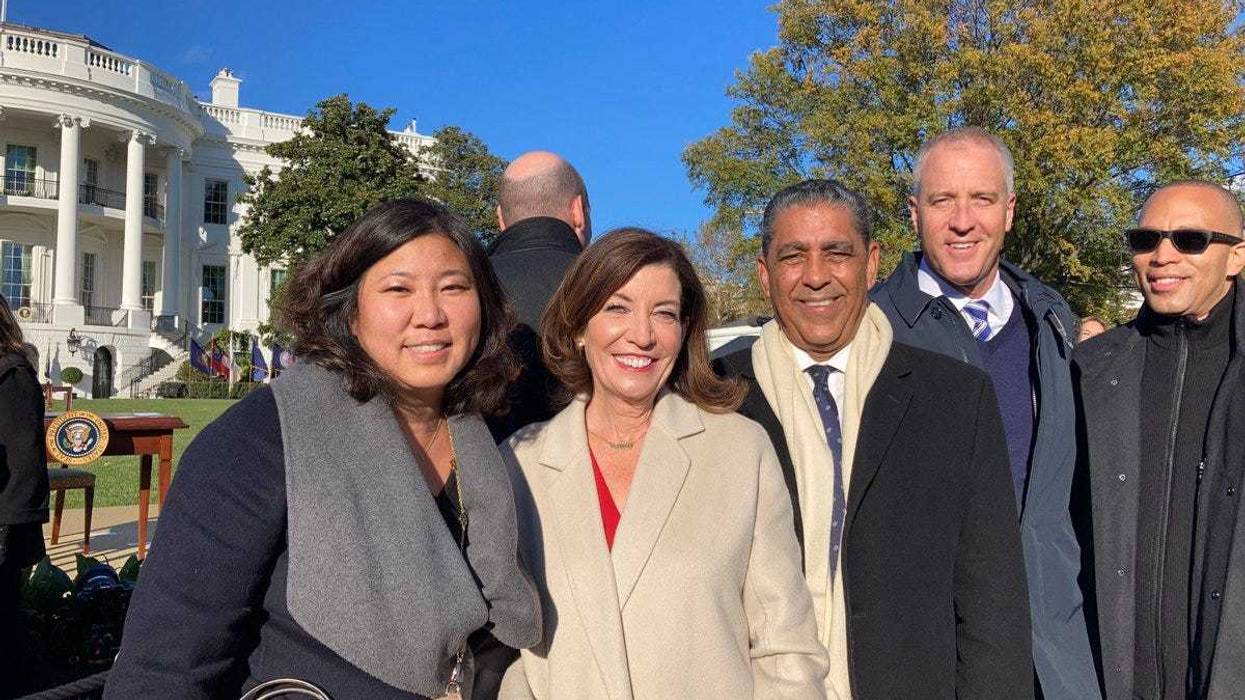 Gov. Kathy Hochul poses for a photo with New York House representatives, including Rep. Grace Meng, Rep. Adriano Espaillat, Rep. Sean Patrick Maloney and Rep. Hakeen Jeffries.