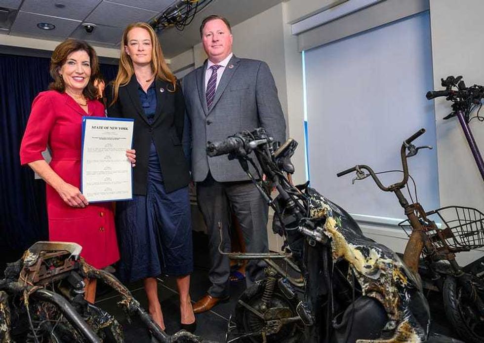 Gov. Kathy Hochul signs legislation to encourage the safe use of e-bikes and lithium-ion batteries on July 11, 2024.