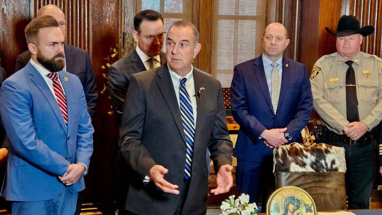Gov. Mike Kehoe speaks Wednesday before signing a bill that puts the St. Louis Metropolitan Police Department under control of a state board