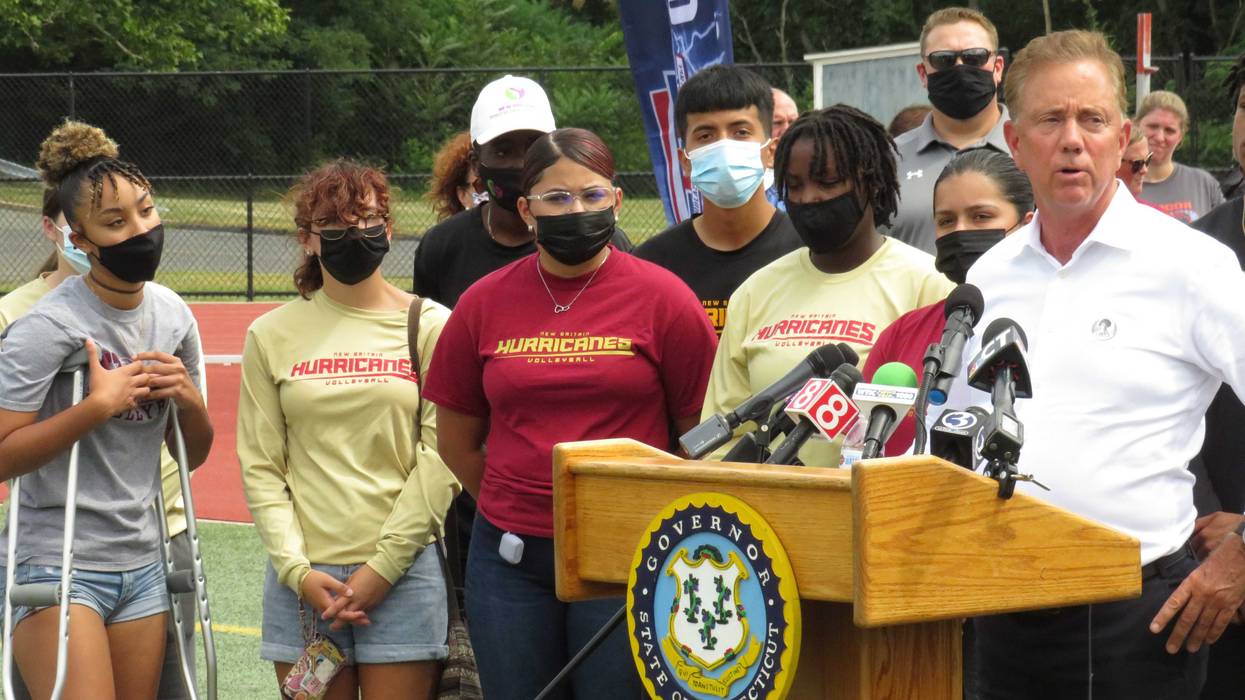 Gov. Ned Lamont and student-athletes from New Britain High School at the CIAC's "Stay in the Game" event, promoting COVID vaccination for teens, 8/17/21
