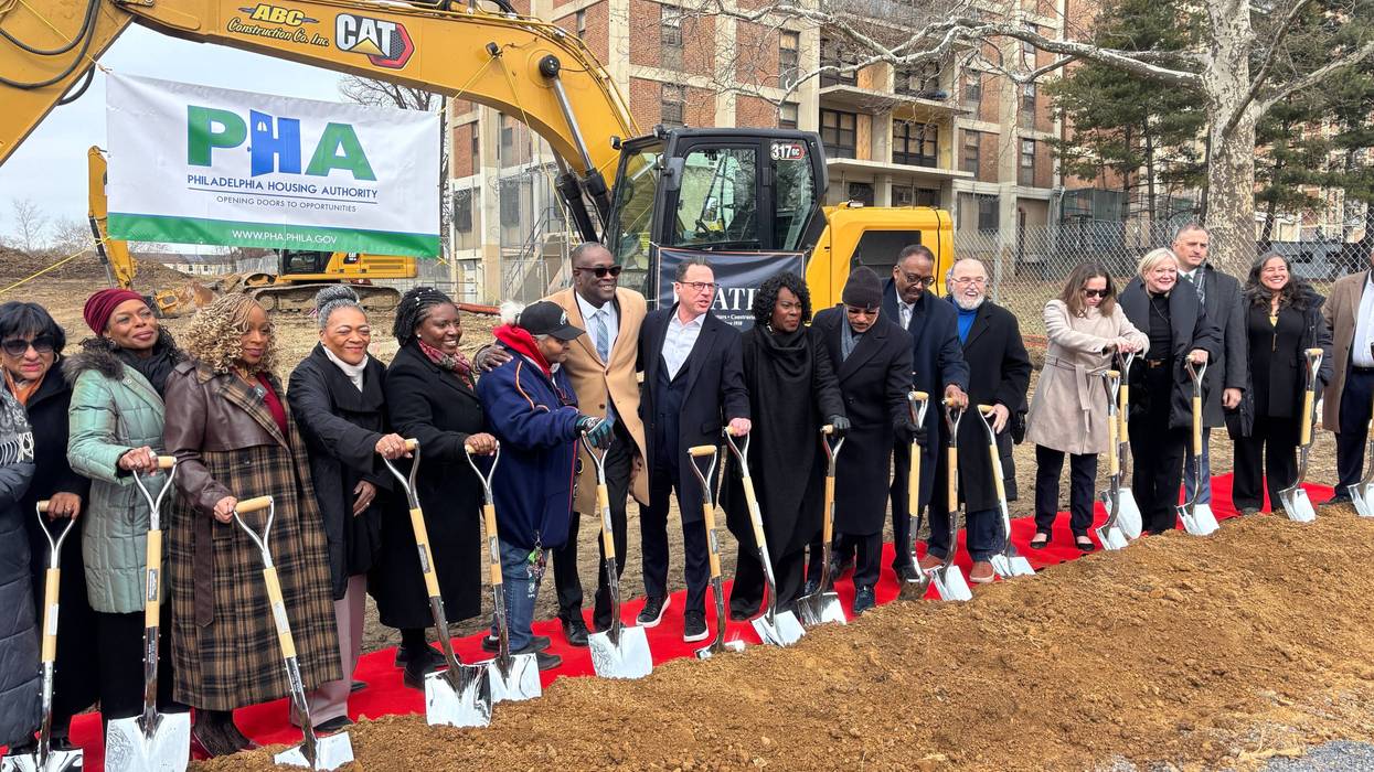 Gov. Shapiro, Mayor Parker and other dignitaries hold shovels at the groundbreaking ceremony for a PHA's Westpark highrise