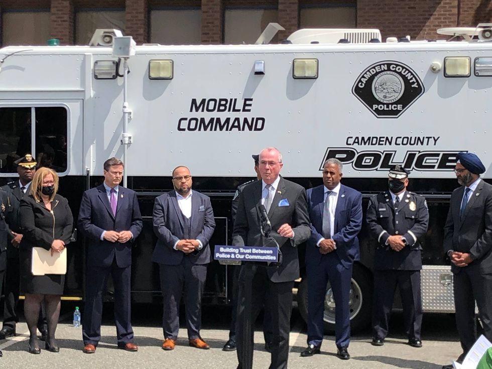 Governor Phil Murphy and law enforcement leaders at the Camden County Police Department.