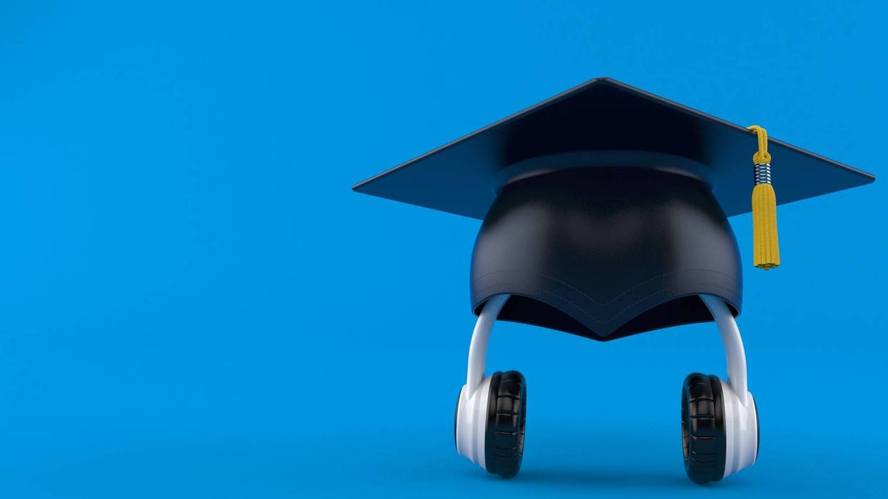 grad cap over headphones