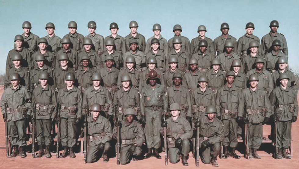 Graduation from basic training, Fort Bragg, North Carolina. Michael is second from the left, top row.