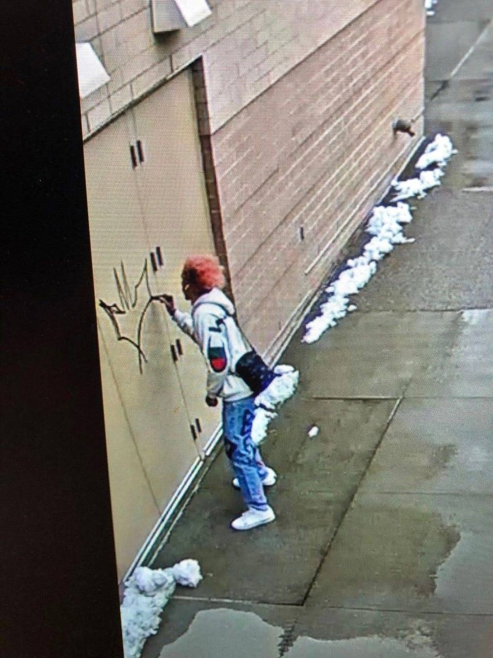 Graffiti suspect wanted by Pittsburgh Police accused of painting on an outside wall of PPG Paints Arena