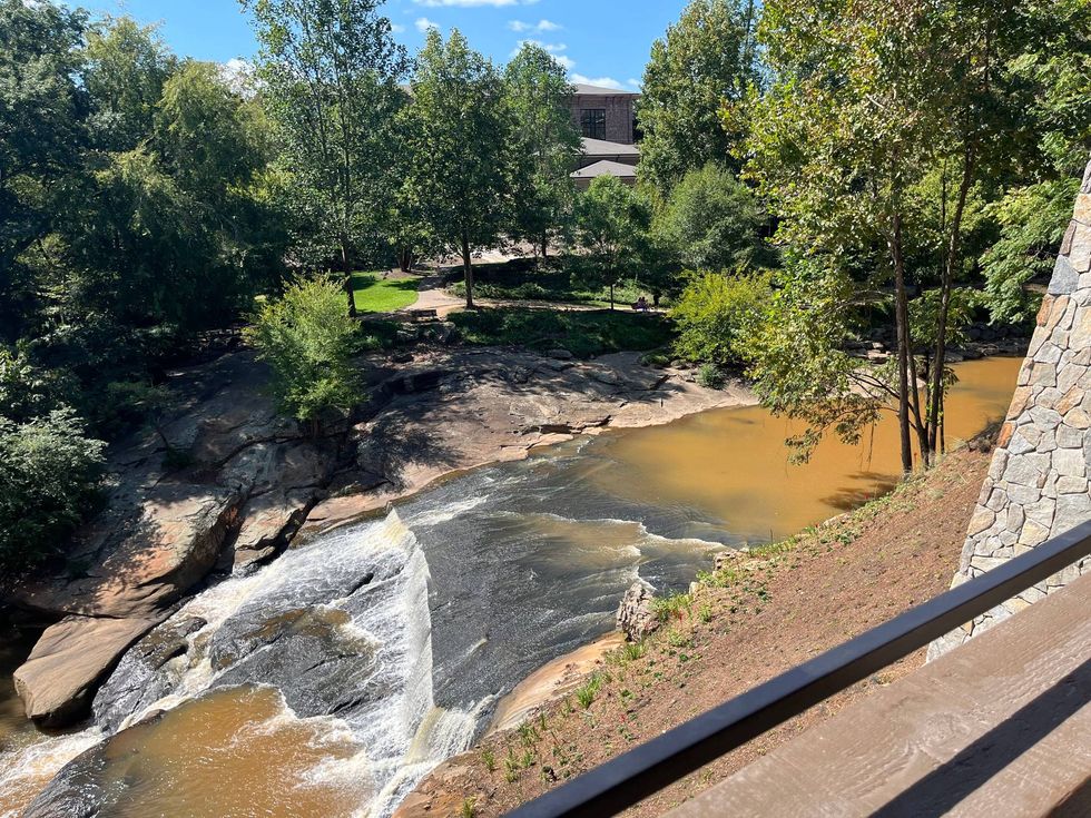 Grand Bohemian Greenville hotel room balcony overlooking falls park