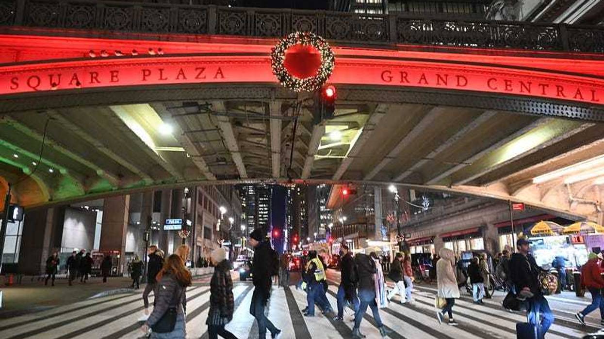 Grand Central Plaza lit red for World AIDS Day 2021.