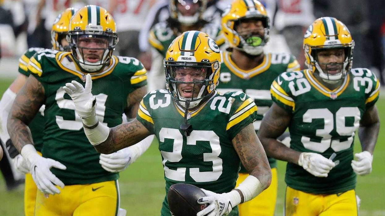 Green Bay Packers cornerback Jaire Alexander (23) celebrates a fourth quarter interception against the Tampa Bay Buccaneers during the NFC Championship game on Sunday, January 24, 2021, at Lambeau Field in Green Bay, Wis. Wm. Glasheen USA TODAY NETWORK-Wisconsin
