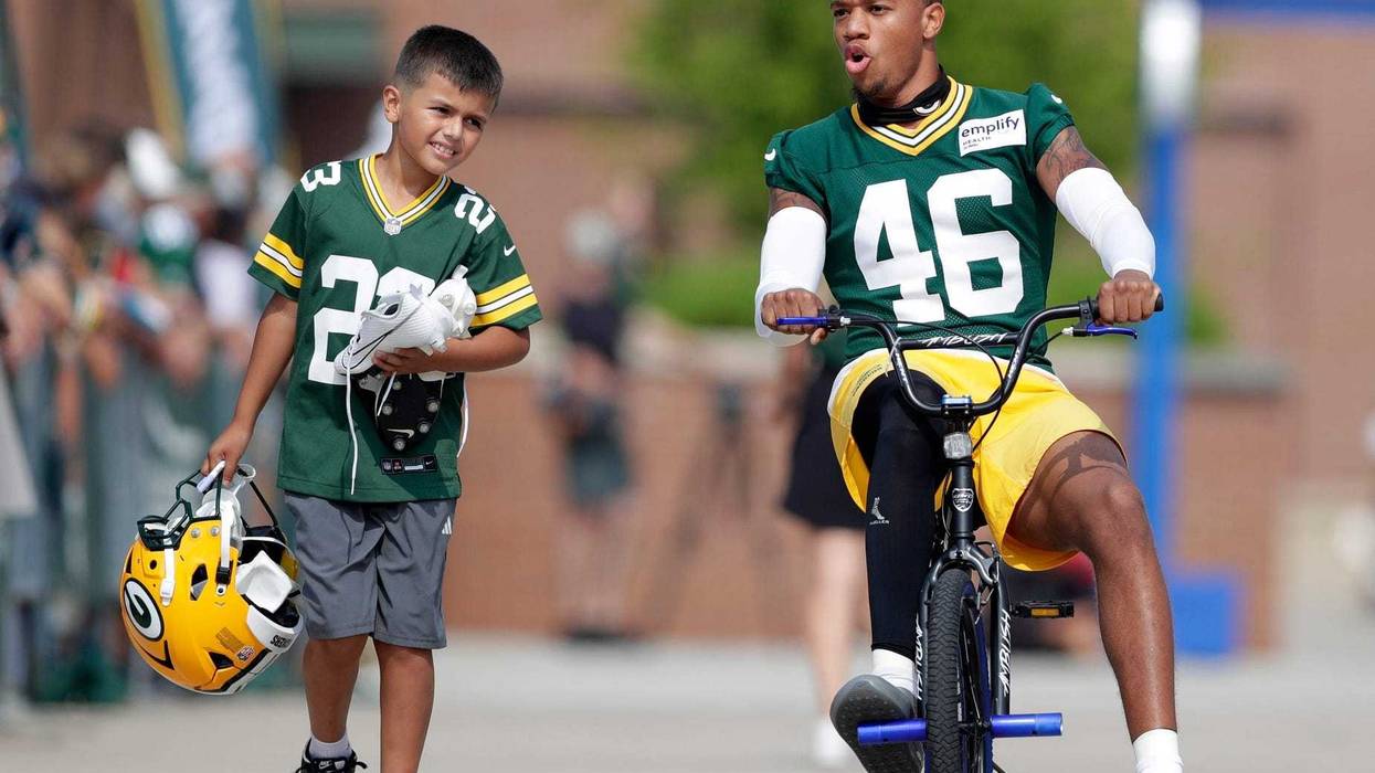 Green Bay Packers cornerback Tyron Herring (46) participates in the Dream Drive bicycle ride on the third day of training camp July 25, 2025, in Green Bay, Wis.