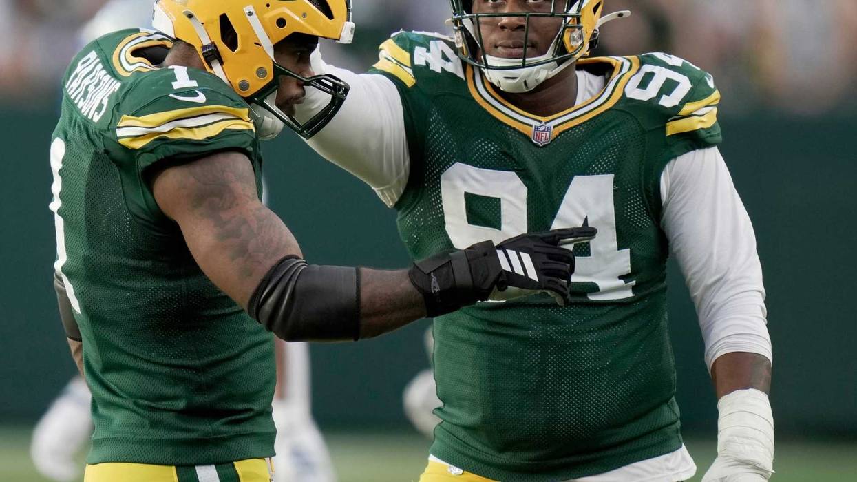 Green Bay Packers defensive end Karl Brooks (94) is shown with defensive end Micah Parsons (1) during the fourth quarter of their game Sunday, September 7, 2025 at Lambeau Field in Green Bay, Wisconsin. The Green Bay Packers beat the Detroit Lions 27-13.