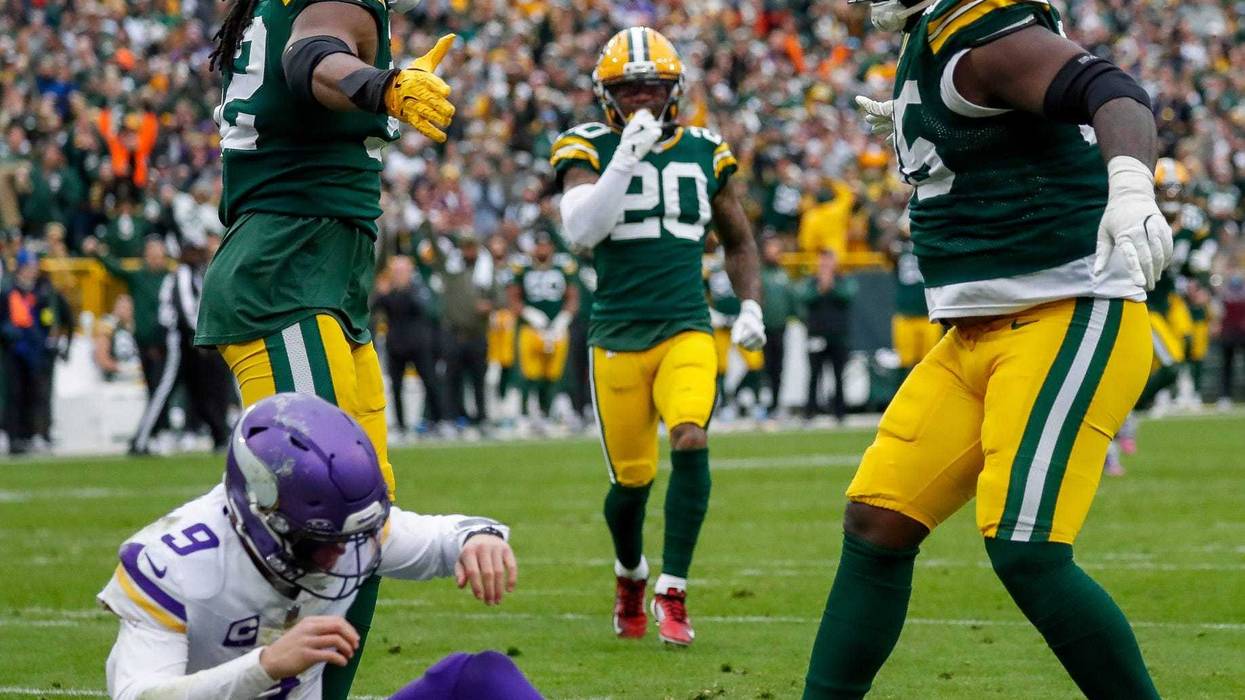 Green Bay Packers defensive tackle Devonte Wyatt (95) celebrates with defensive end Rashan Gary (52) after sacking Minnesota Vikings quarterback J.J. McCarthy (9) on Sunday, November 23, 2025, at Lambeau Field in Green Bay, Wis. The Packers won the game, 23-6.