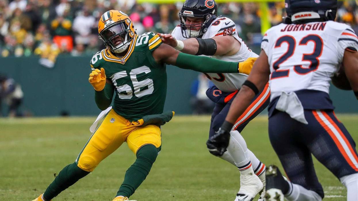 Green Bay Packers linebacker Edgerrin Cooper (56) beats a block by Chicago Bears center Coleman Shelton (65) as he pursues running back Roschon Johnson (23) on Sunday, January 5, 2025, at Lambeau Field in Green Bay, Wis. Tork Mason/USA TODAY NETWORK-Wisconsin
