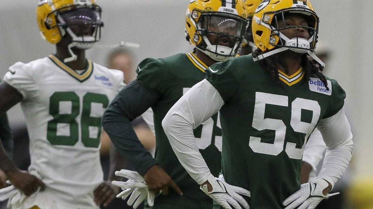 Green Bay Packers linebacker Ty'Ron Hopper (59) warms up during rookie minicamp on Friday, May 3, 2024, at the Don Hutson Center in Green Bay