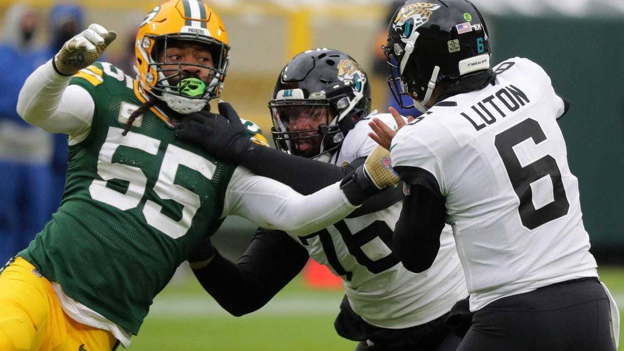 Green Bay Packers outside linebacker Za'Darius Smith (55) pressures Jacksonville Jaguars quarterback Jake Luton (6) during the fourth quarter of their game at Lambeau Field in Green Bay, Wis. The Packers beat the Jaguars 24-20.