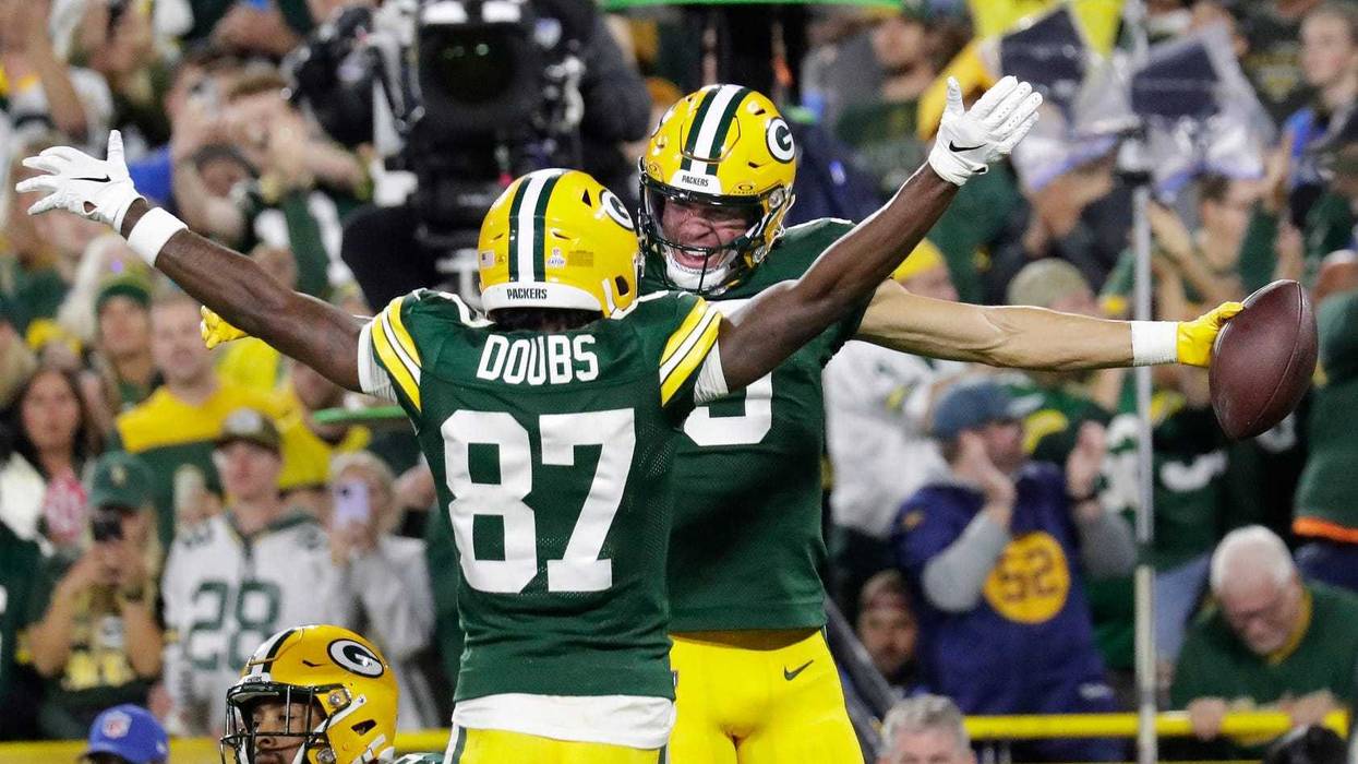 Green Bay Packers wide receiver Christian Watson (9) celebrates with wide receiver Romeo Doubs (87) after scoring a touchdown against the Detroit Lions during their football game Thursday, September 28, 2023, at Lambeau Field in Green Bay, Wis.