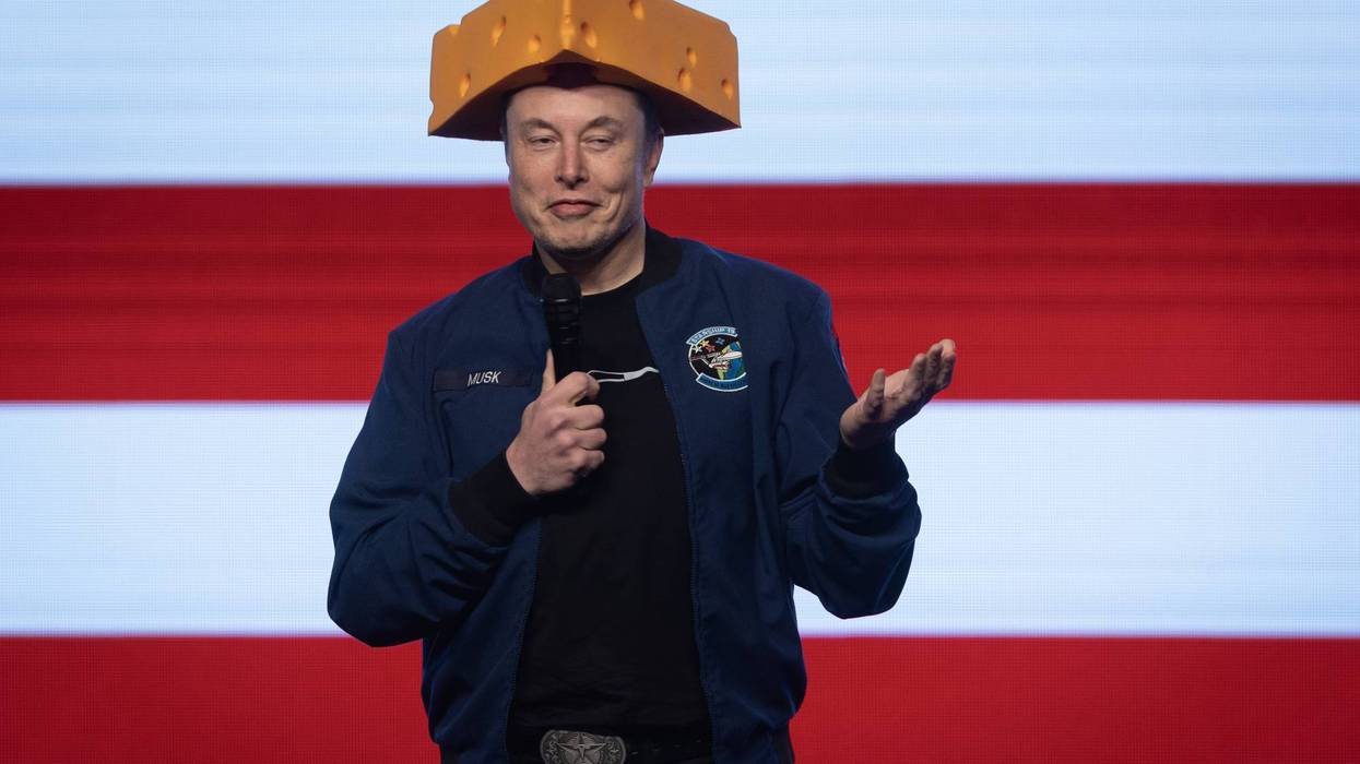 GREEN BAY, WISCONSIN - MARCH 30: Billionaire businessman Elon Musk arrives for a town hall wearing a cheesehead hat at the KI Convention Center on March 30, 2025 in Green Bay, Wisconsin. The town hall is being held in front of the state’s high-profile Supreme Court election between Circuit Court Judge Brad Schimel, who has been financially backed by Musk and endorsed by President Donald Trump, and Dane County Circuit Court Judge Susan Crawford.