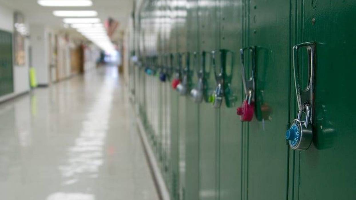 Green lockers in school hallway