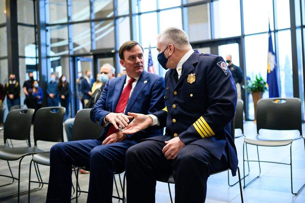 Greenville Police Department honor guard officers during a memorial service for officer Allen Jacobs at Bob Jones University Thursday, March 18, 2021.