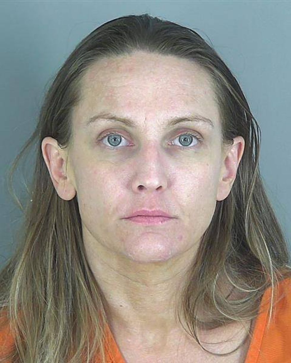 Greer woman arrested in raid