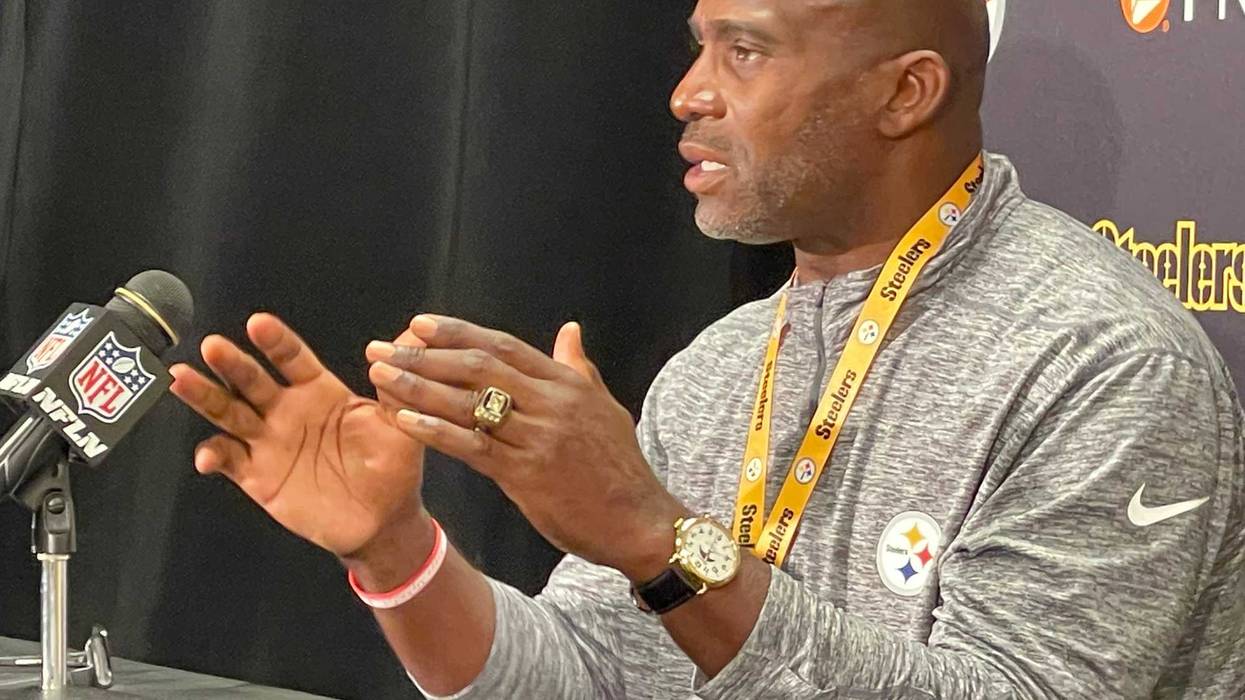 Greg Lloyd at podium