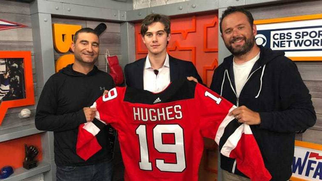 Gregg Giannotti and Jerry Recco pose with Jack Hughes of the New Jersey Devils on June 24, 2019.