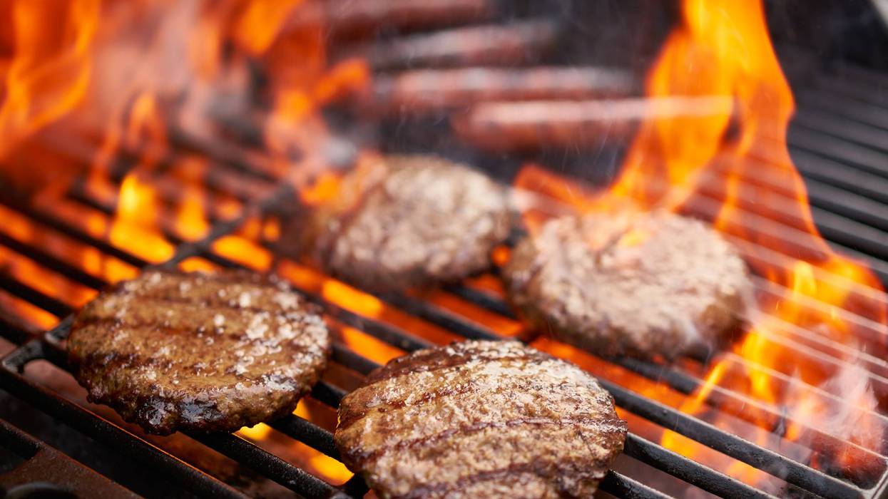 grilling hamburgers and hot dogs