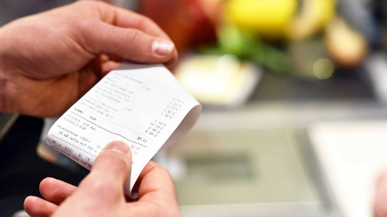 Grocery receipt at the cash register.
