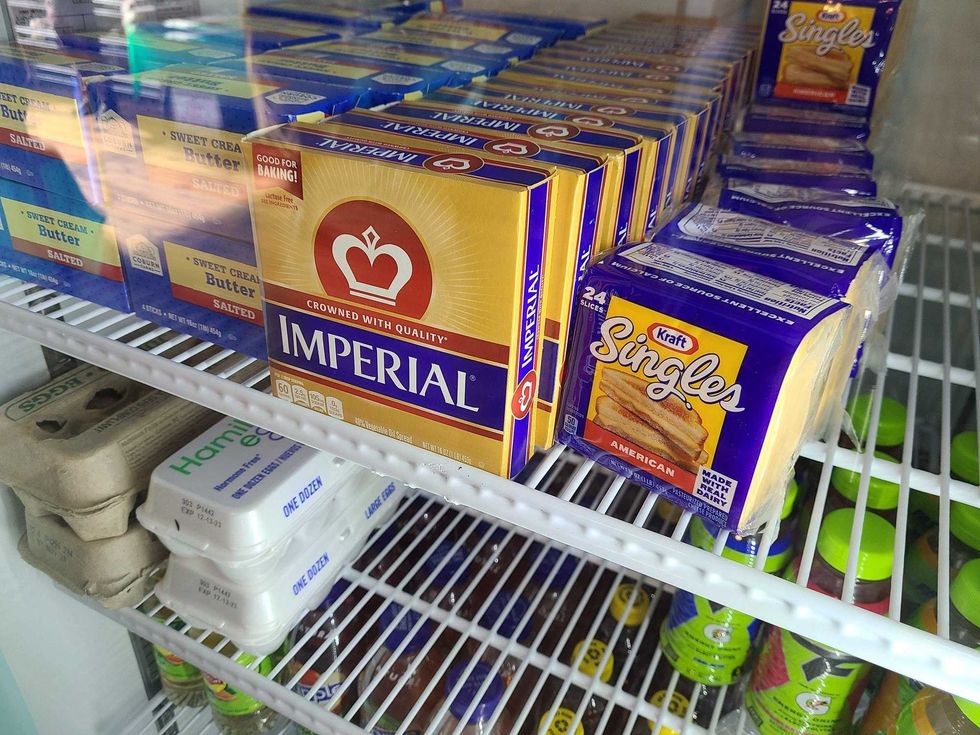 Grocery store items in a refrigerator