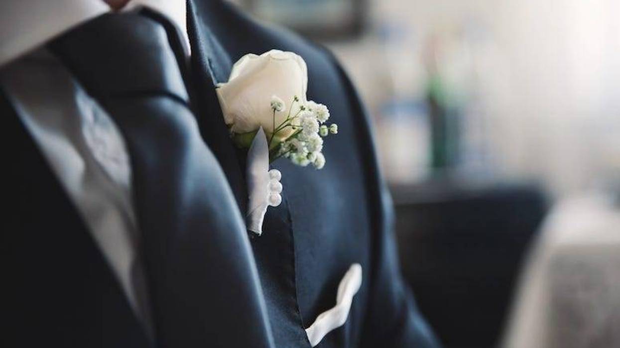 Groom preparing for wedding ceremony