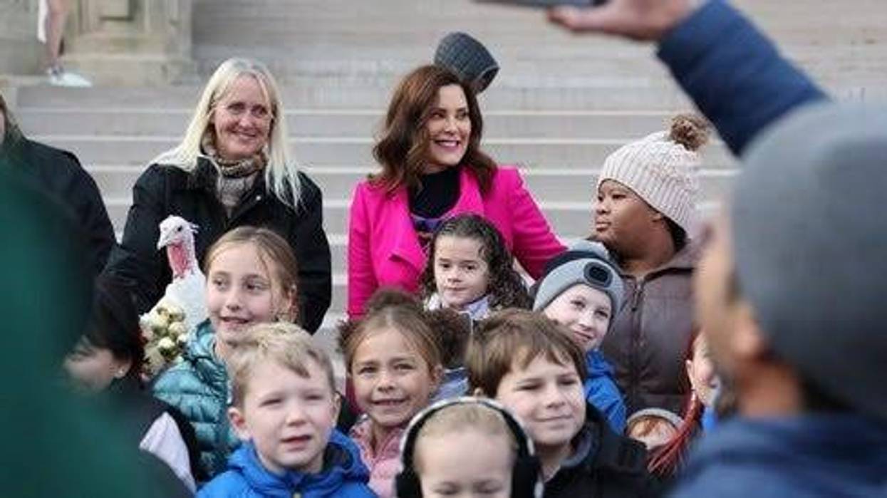 Group of children, governor and a turkey