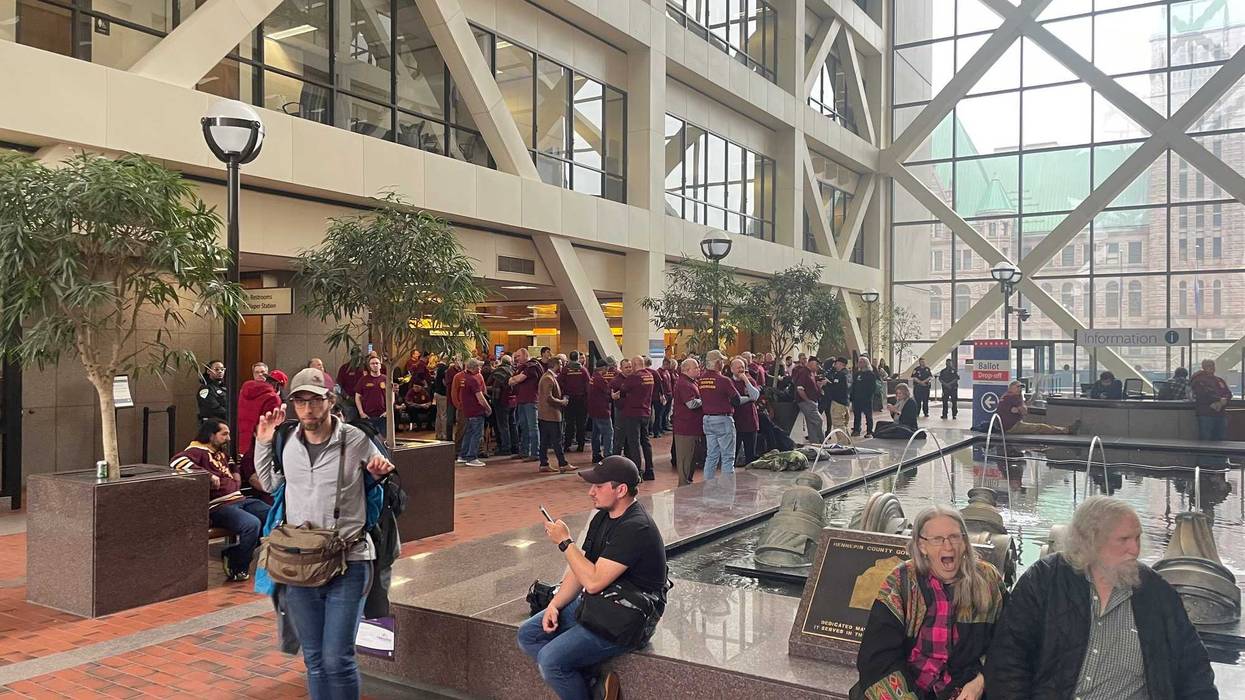 Groups gathered inside the Hennepin County Government Center.