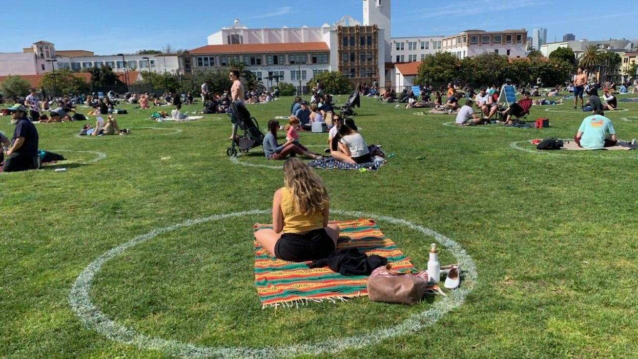 Groups socially distance at San Francisco's Mission Dolores Park