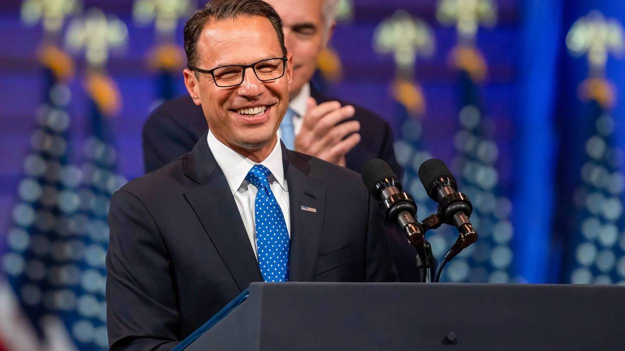 Gubernatorial candidate Josh Shapiro smiles at the podium. President Joe Biden made a visit to Wilkes-Barre, Pennsylvania to discuss his plan to reform gun control, during his speech he touted beating the NRA. Biden is visiting cities for his Safer America plan.