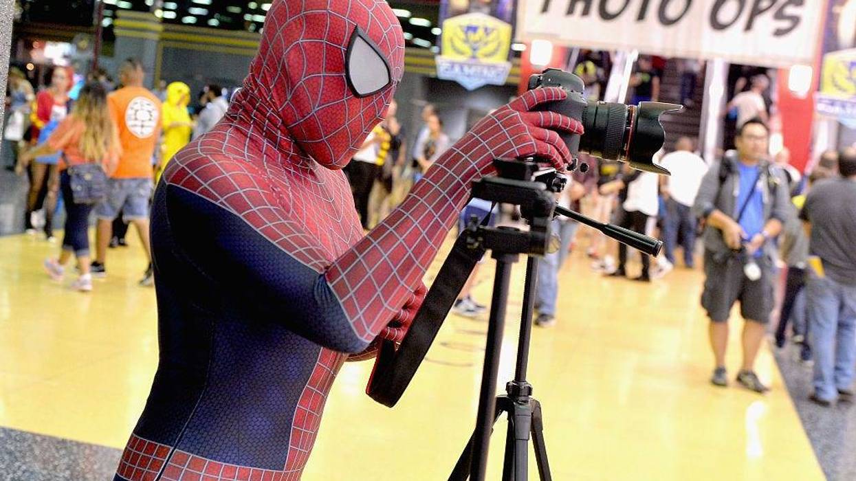 Guest cosplays as Spiderman during Wizard World Comic Con Chicago 2016