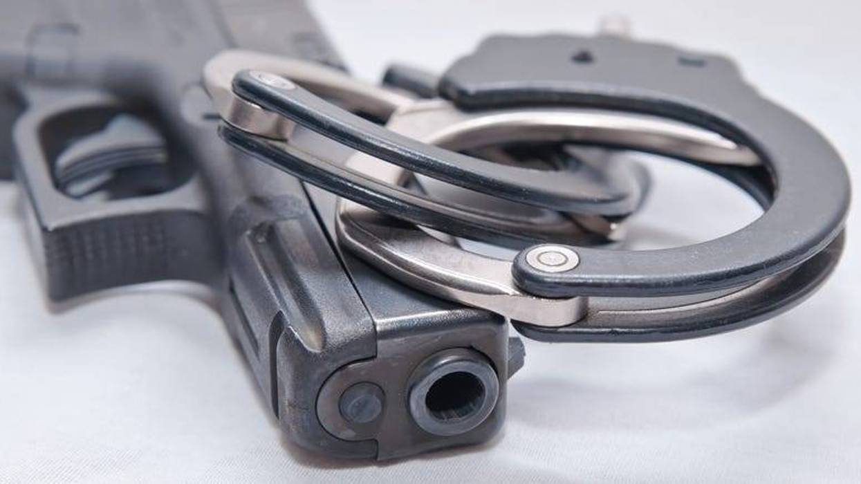 gun and handcuffs