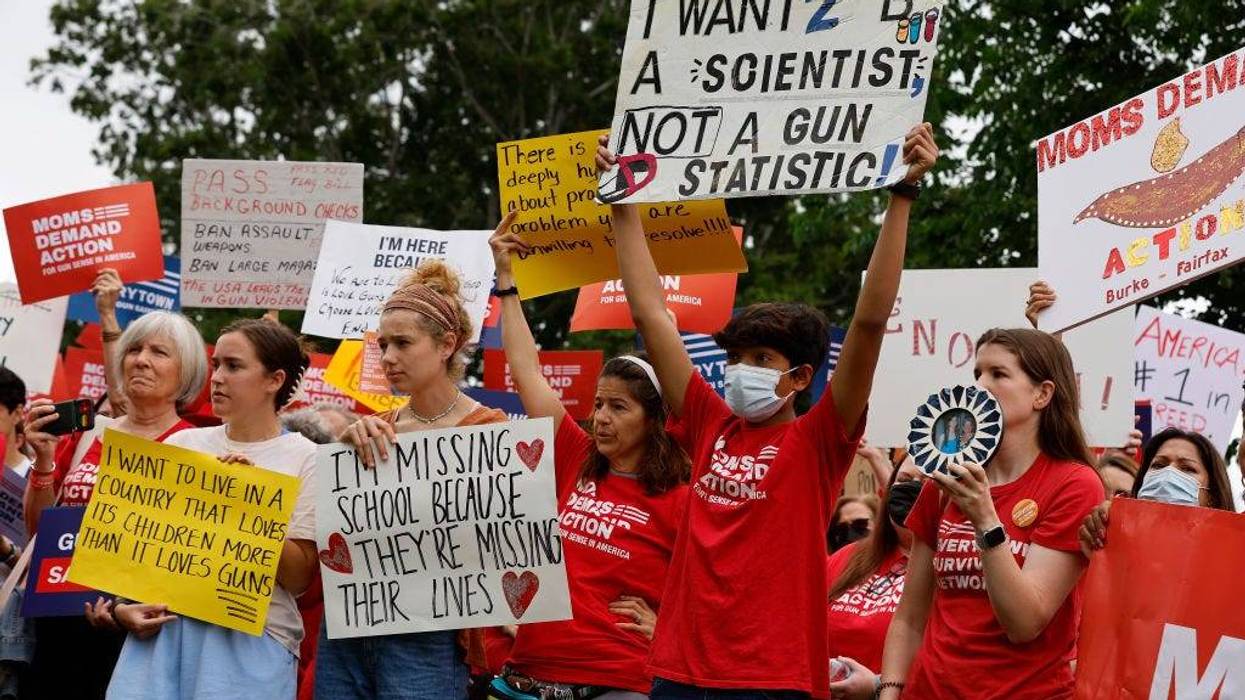 Gun control advocacy groups rally with Democratic members of Congress outside the U.S. Capitol on May 26, 2022, in Washington, D.C.