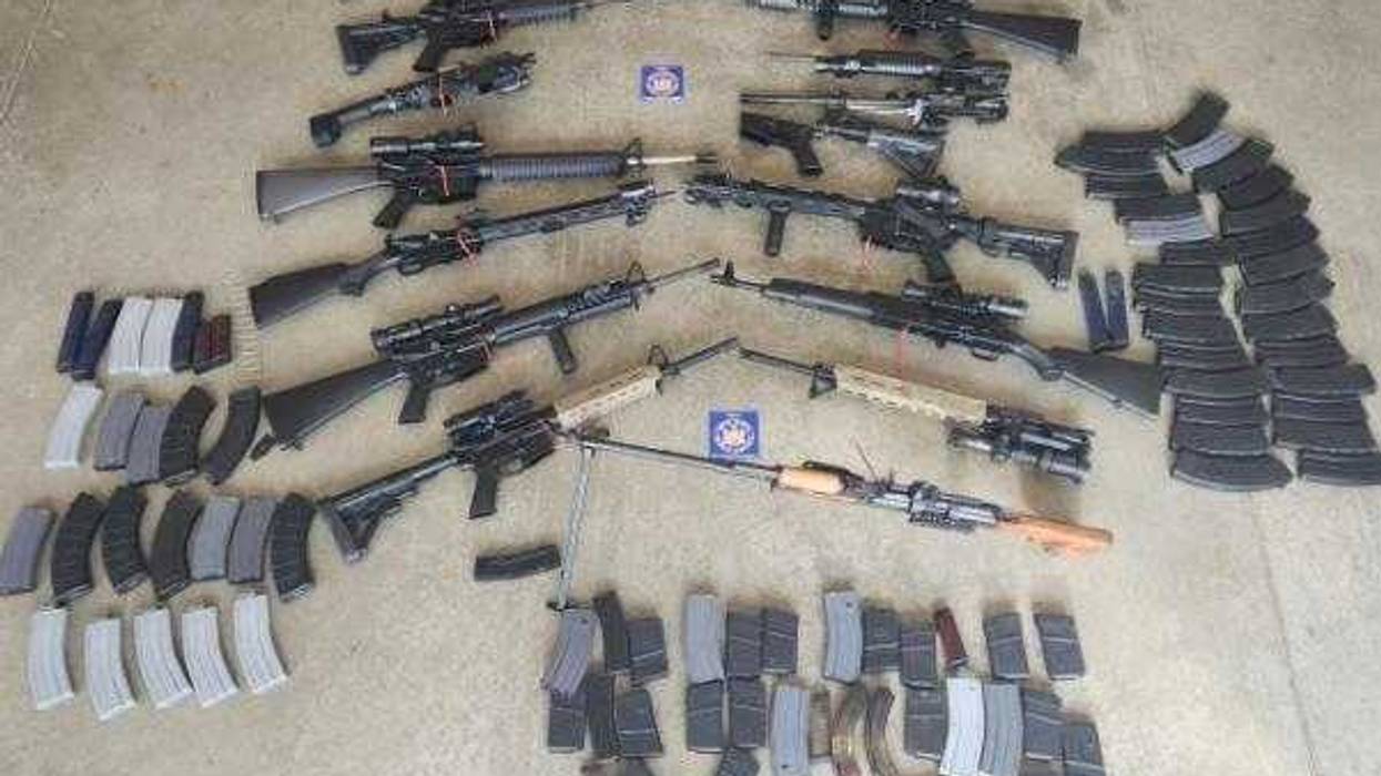 Guns recovered in search warrant