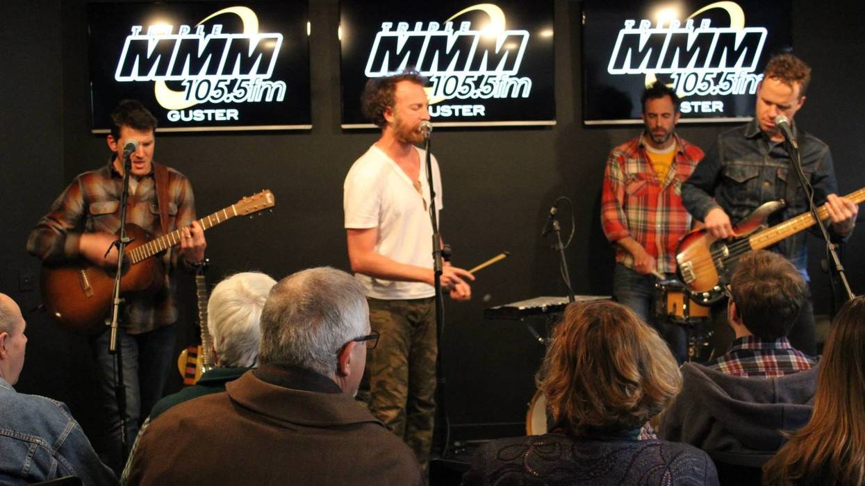 Guster in Studio M with backs of audience members' heads